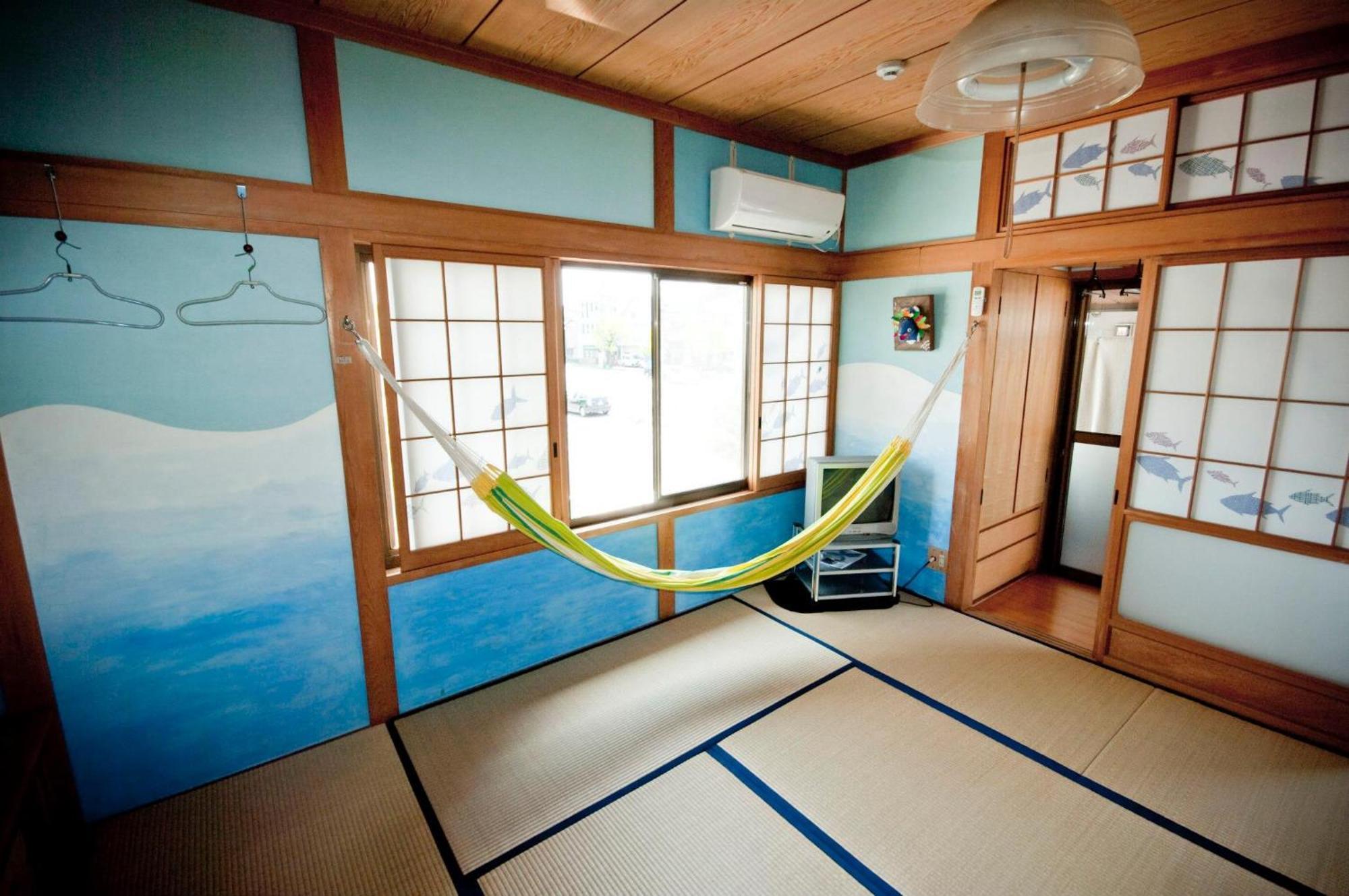 Katsuo Guest House Коті Номер фото